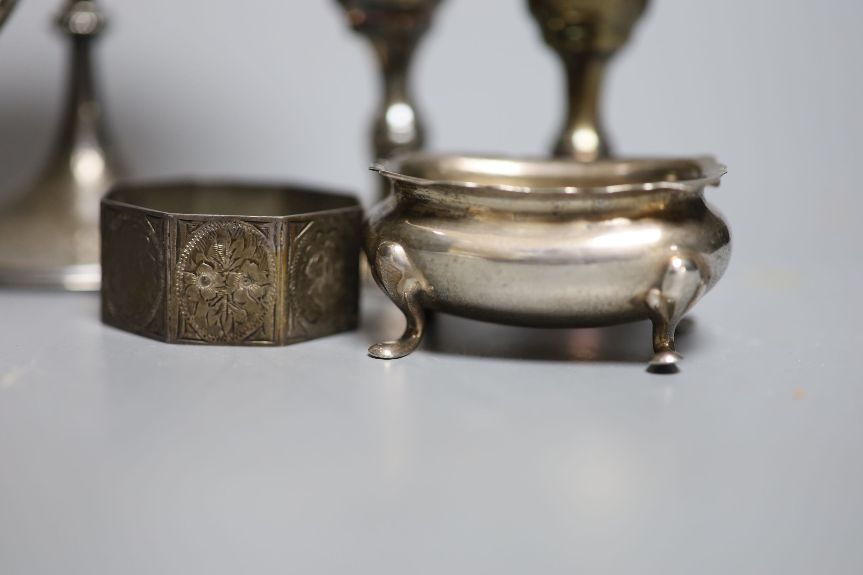 Five George V silver kiddush cups, a late Victorian silver goblet, a silver bonbon dish, silver salt, silver napkin ring and a plated sugar shovel